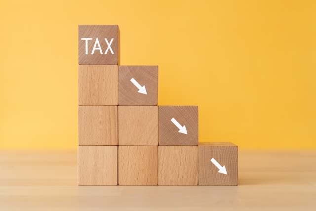 TAXと書かれた木の模型
節税のイメージ