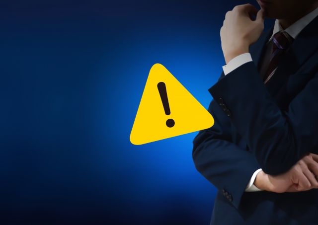 ビジネスマンとビックリマーク