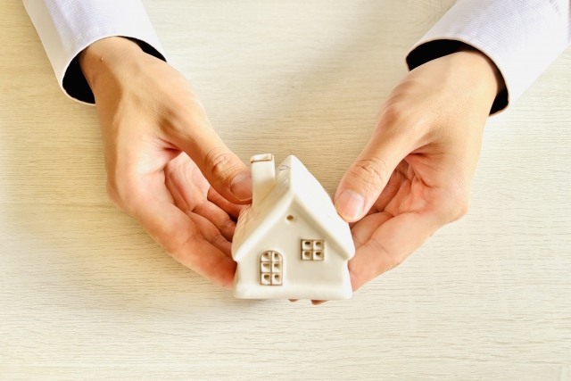 住まいをサポートしているイメージ　家の模型